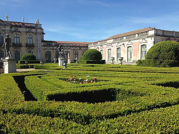 The landscaped gardens of the National Palace of Queluz were originally inspired by Versailles.