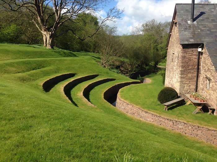The terraced front lawns at Allt-y-bela