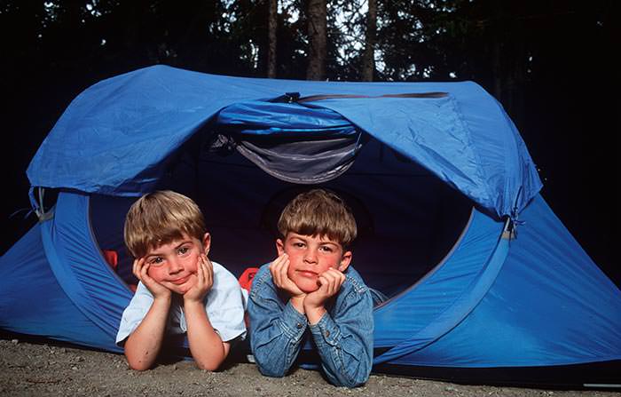 Children Hanging Out In Their Pop Up Tent In The Garden