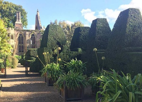 Nymans famous Topiary Garden clipped Yew hedging